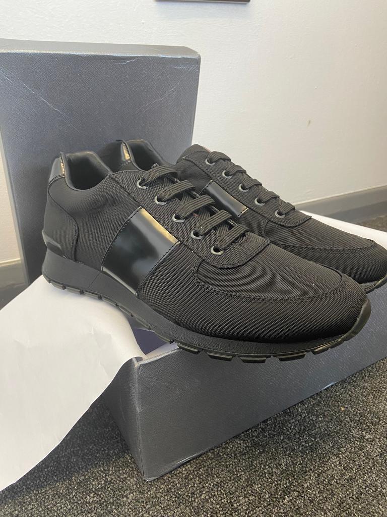 red prada trainers